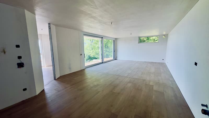 ESCLUSIVO E SPAZIOSO 4.5 LOCALI CON GIARDINO IN CAPRIASCA (4)