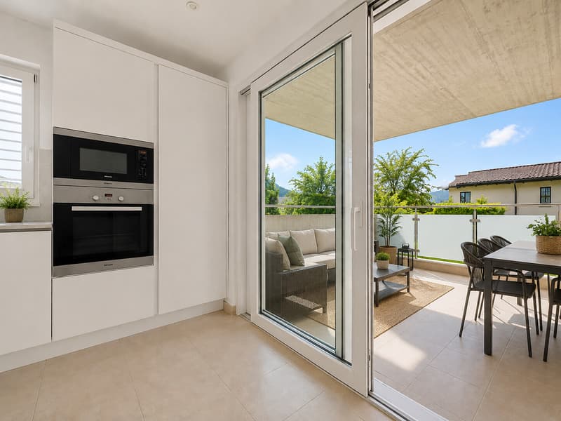 MODERNO E ACCOGLIENTE 3.5 LOCALI CON AMPIA TERRAZZA A CURIO (4)