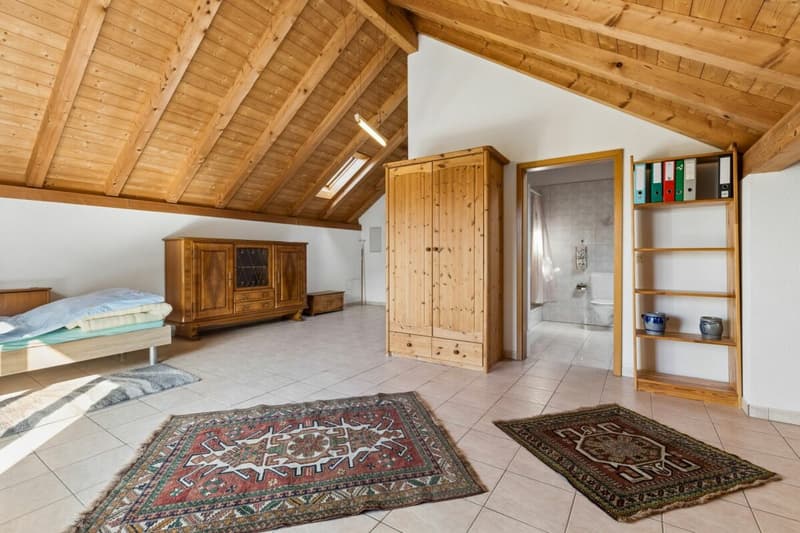 Zimmer im Dachgeschoss mit eigenem Badezimmer