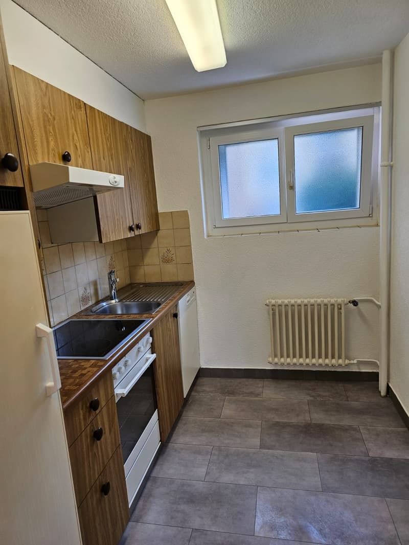 modern kitchen, tiled floor, gas stove, sink, refrigerator, dishwasher, wooden cabinets, heating