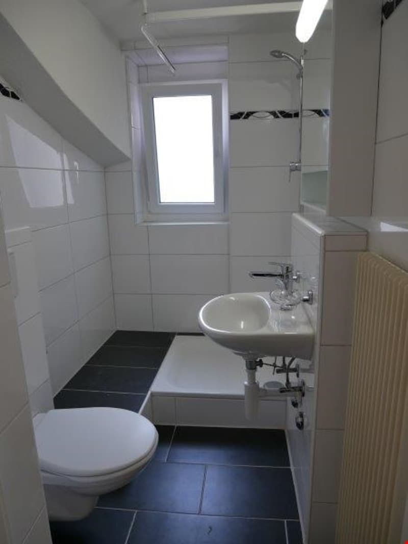modern white tiles, toilet, shower cubicle, white ceramic sink, white porcelain bathtub