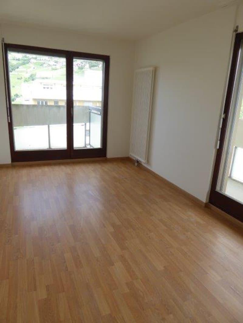 Spacieux appartement de 4 pièces avec balcon et garage à Sierre (2)
