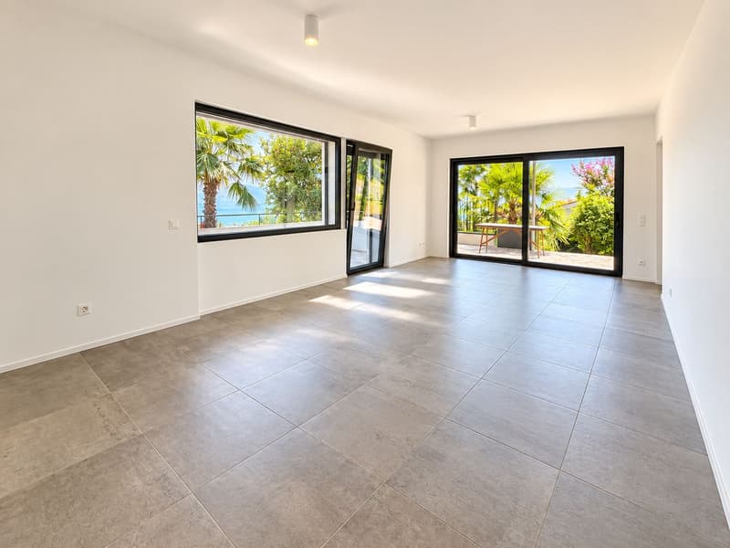 Porza - Elegante appartamento 3.5 locali con vista lago, terrazzo e giardino privato (2)