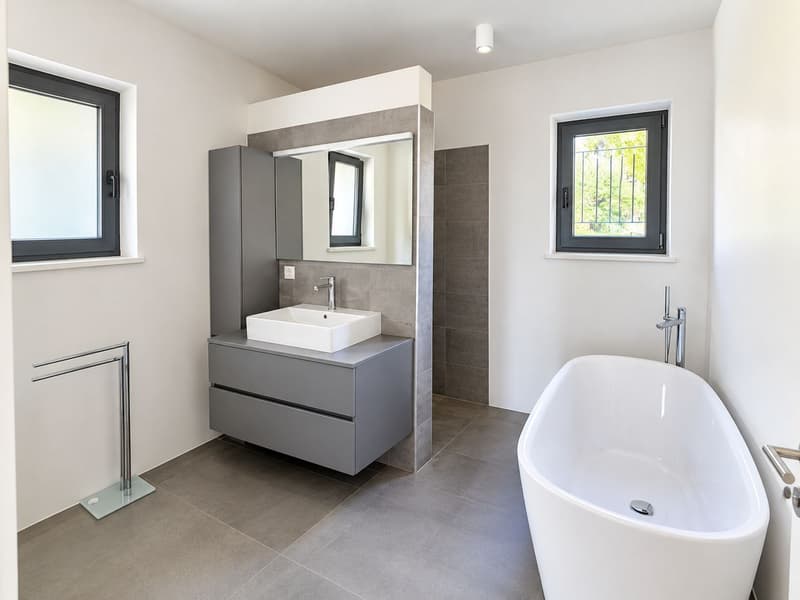 Porza - Elegante appartamento 3.5 locali con vista lago, terrazzo e giardino privato (9)