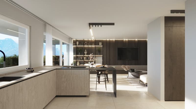 Modern, open-concept kitchen with concrete countertops, built-in shelving, and a dishwasher. The kitchen flows into a dining and living area with large windows offering scenic views.