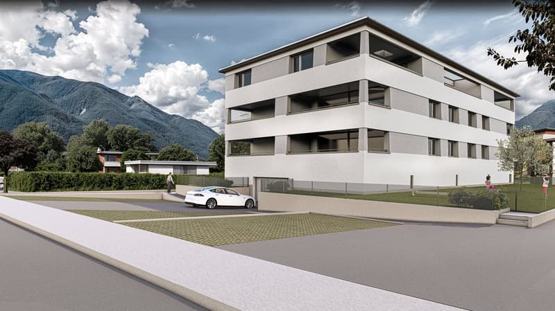 Four-story building, modern design, white exterior, multiple balconies, parking area in front, car parked, green landscaping, view of mountains in the background.