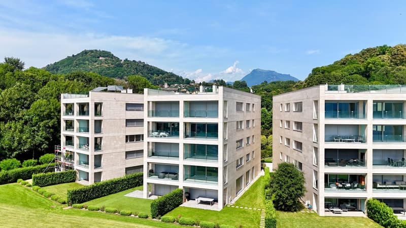 Esclusivo Attico di Lusso Fronte Lago di Lugano con Terrazza sul Tetto (2)