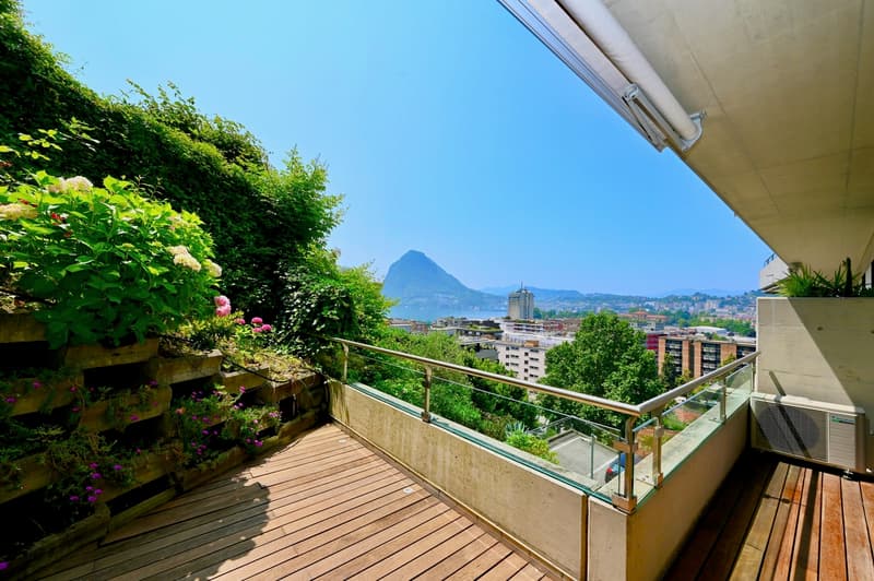 Moderno Appartamento con Terrazza e Vista Mozzafiato sul Lago (2)
