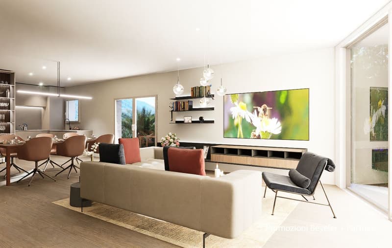 Open-plan living and dining area with contemporary furnishings, a modern flat-screen TV, a bookshelf, and a large window offering scenic views.