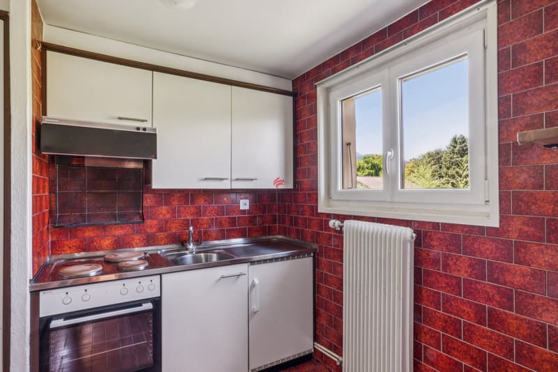 / Cuisine de l'appartement à l'étage
