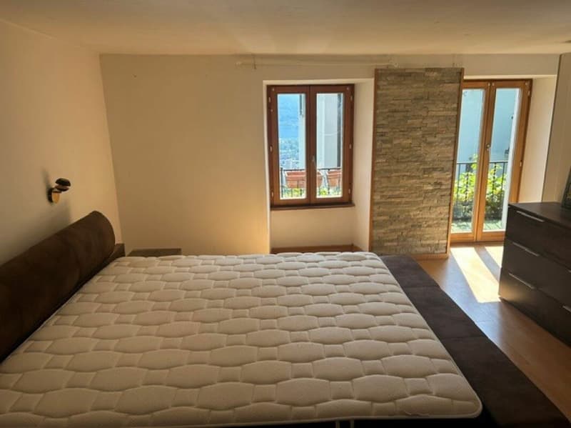 Charmante 3.5-Zimmerwohnung mit Cheminée, Balkon und modernem Wohnkomfort in Orselina / Affascinante appartamento di 3.5 locali con camino, balcone e comfort abitativo moderno a Orselina (5)