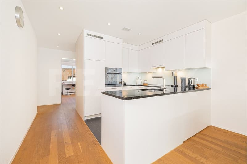 4.5-Zimmer-Wohnung mit sonnigem Balkon und zwei Tiefgaragenplätzen (4)