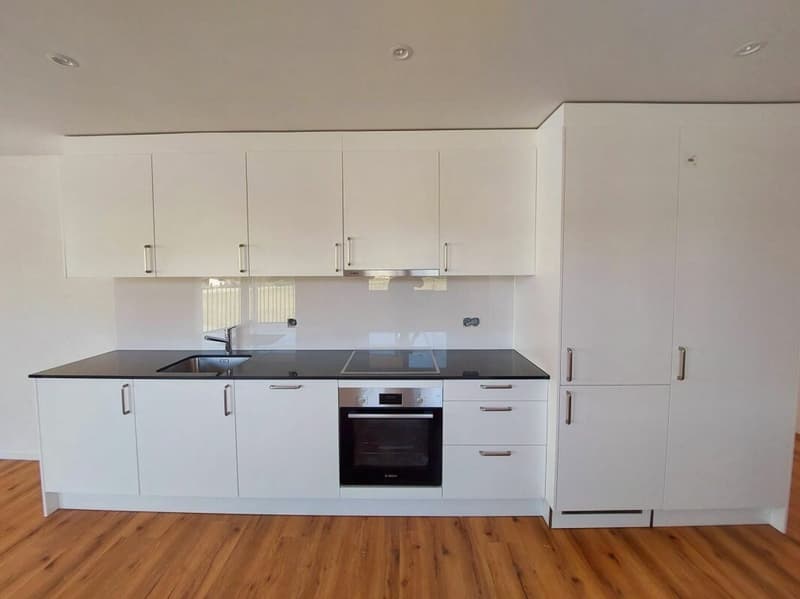Stilvolle 2.5-Zimmer-Neubauwohnung mit 60 m² und sonnigem Balkon (2)