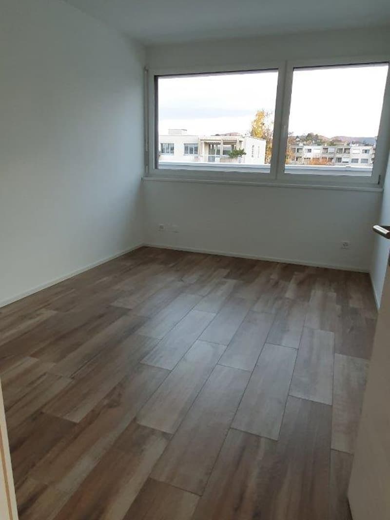 empty room, wooden floor, large window, white walls