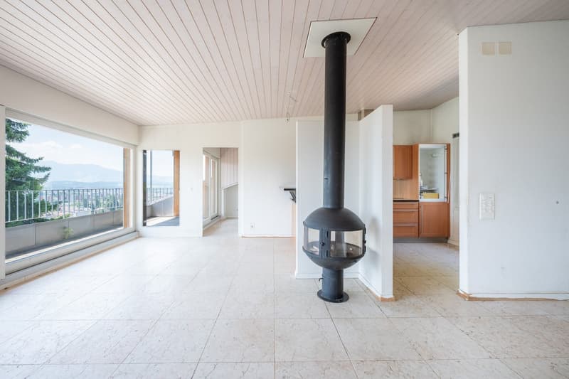 empty room, fireplace, balcony, large windows, tiled floor