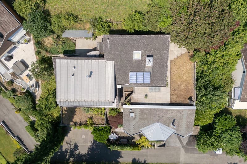 3 story house, solar panels, driveway, garden, swimming pool
