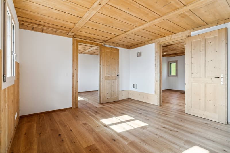 wooden ceiling, wooden walls, wooden floor, large windows