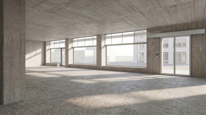 Empty room with concrete walls, large windows, and a concrete floor.