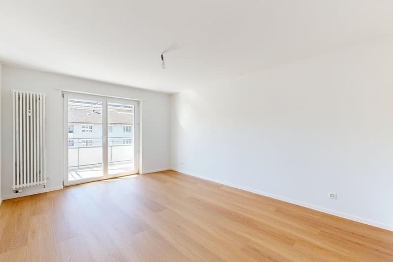 Wohnzimmer mit Balkon