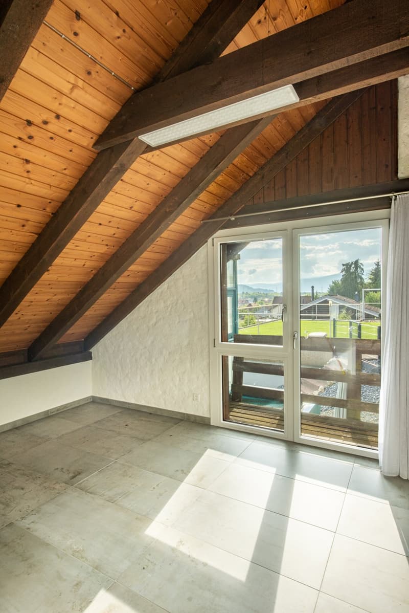 wooden beams, white tiles, sliding glass doors, balcony, window with mountain view