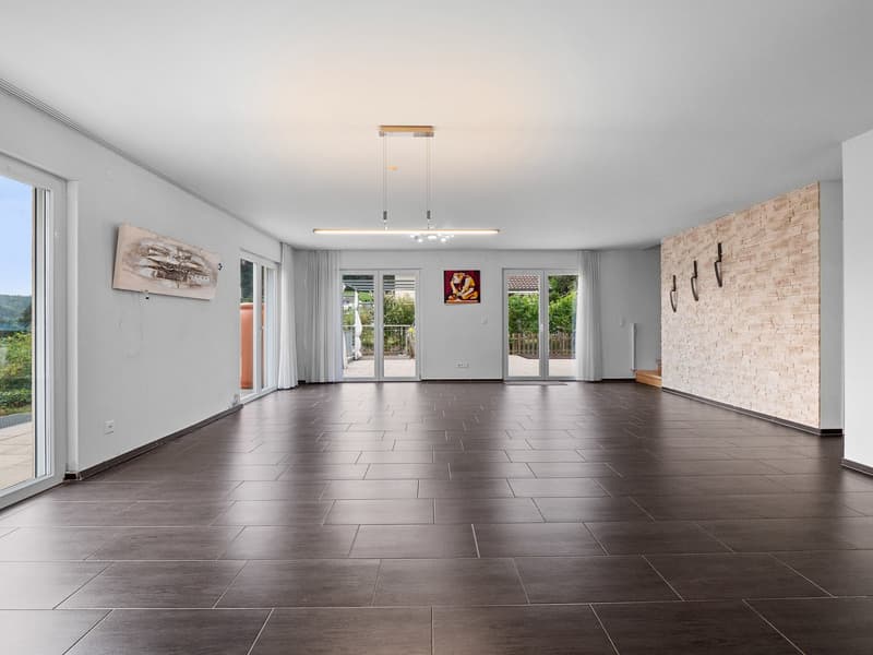 empty room, wooden floor, white walls, ceiling lamps, sliding doors, balcony, view to outside