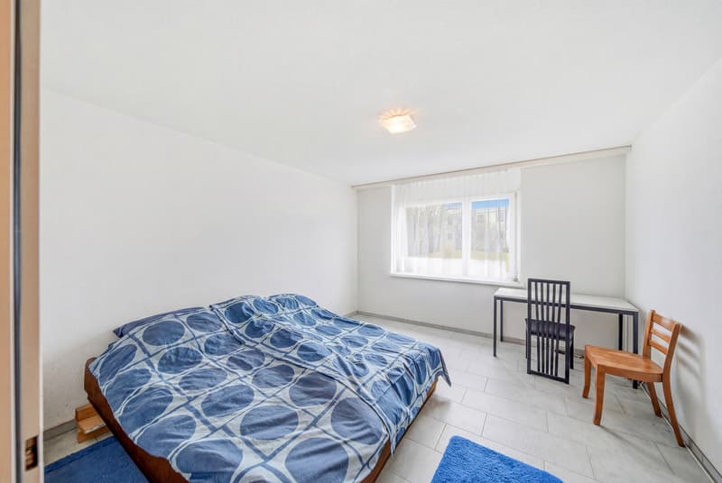 CHARMANTE 2.5-ZIMMER-WOHNUNG MIT WINTERGARTEN UND GRÜNLAGE (3)
