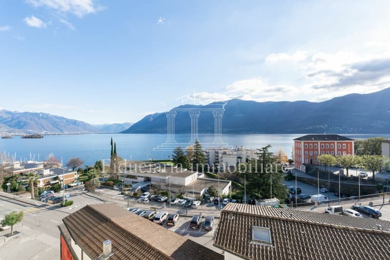 BRISSAGO - Grosszügige Wohnung an zentraler und sonniger Lage mit offener Seesicht (1)