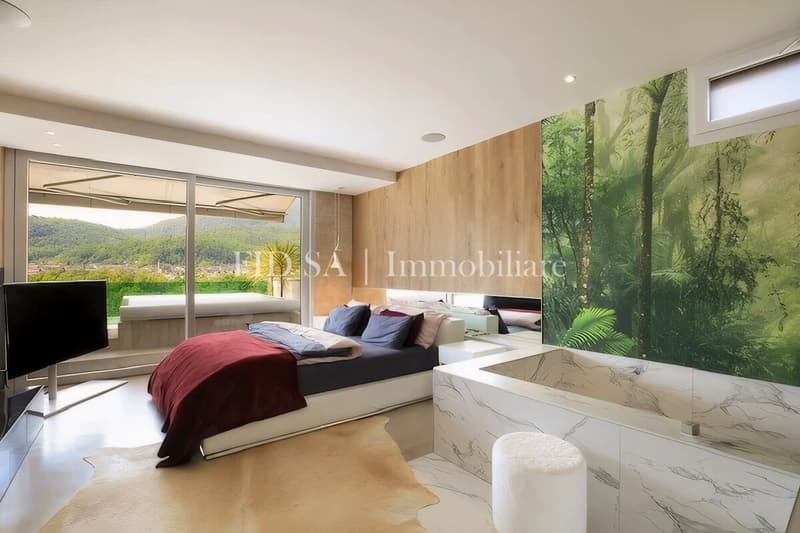 SOLDUNO - Design unico e ampia terrazza con vista nel verde (5)