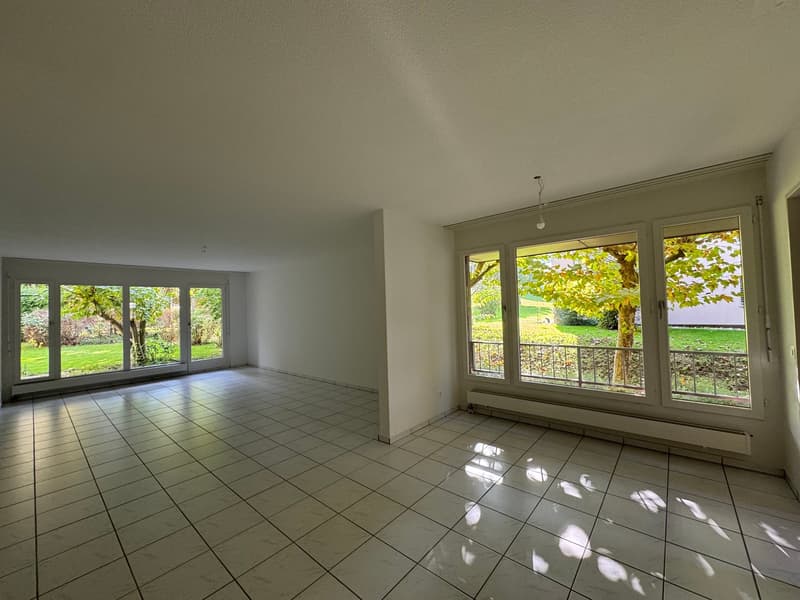 empty room, large windows, balcony, tiled floor