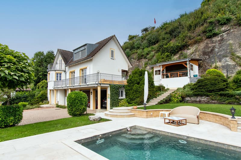 Haus und Umgebung / Maison et environnement