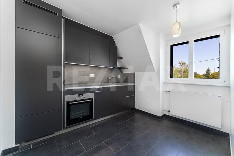 Lumineux appartement de 2,5 pièces avec balcon et vue sur le lac (4)
