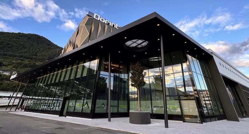 modern architecture, large glass facade, mountain view