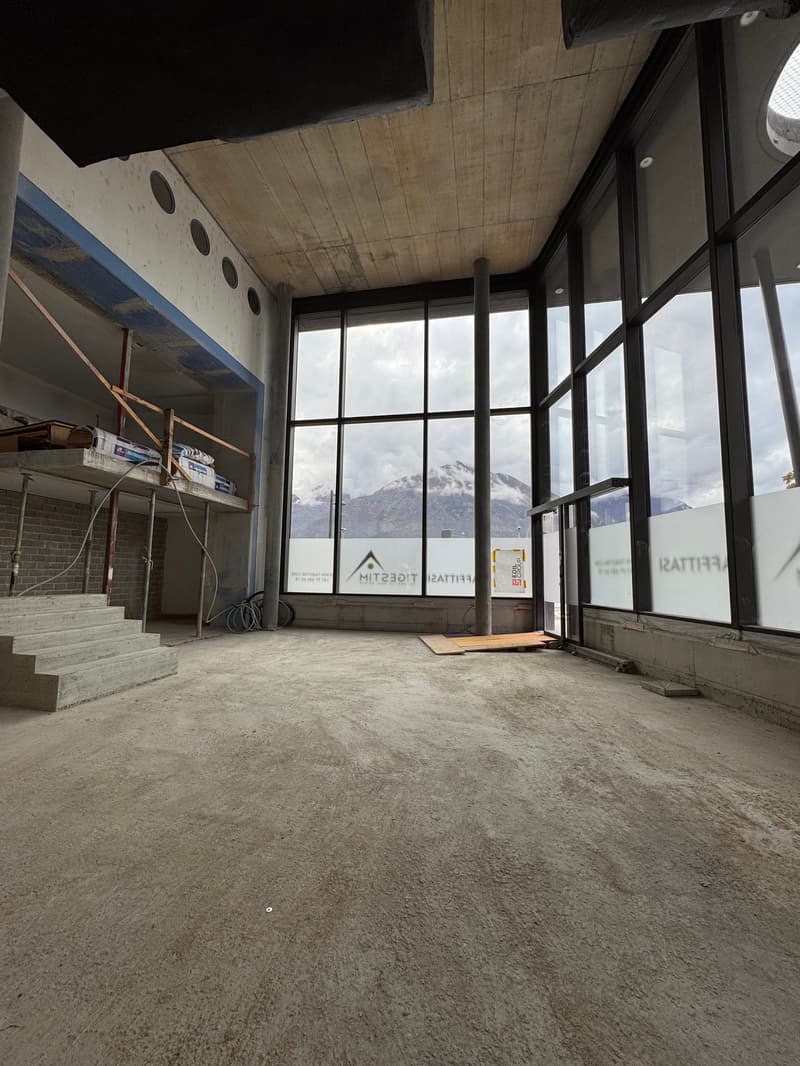 unfinished room with windows overlooking mountains