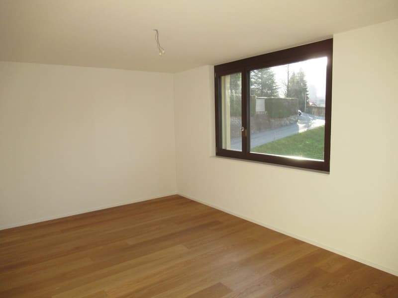 empty room, white walls, wooden floor, large window with view
