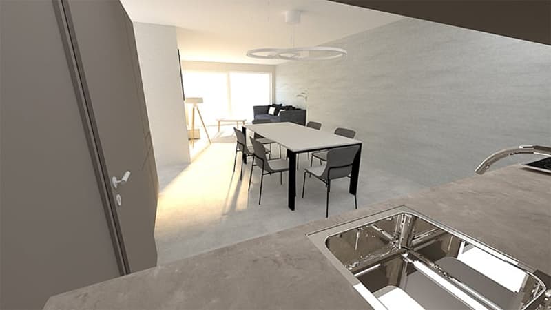 The image shows a modern dining room with a large dining table and chairs. The room has a minimalist and clean design with white walls and a concrete floor. There is a circular light fixture hanging above the dining table, providing ambient lighting to th