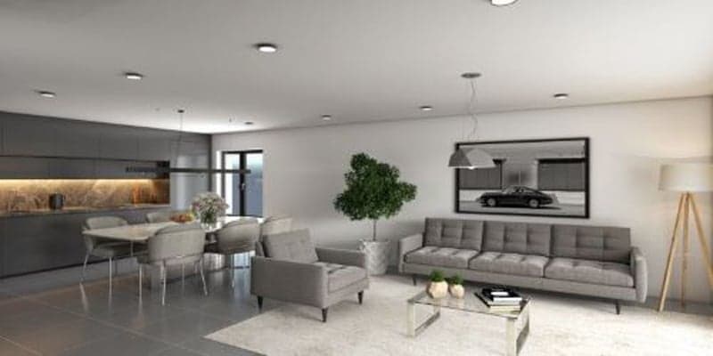 Open plan living and dining area, modern gray furniture, white carpet, white walls, gray kitchen, modern ceiling lights, white framed window with outdoor view, indoor plant, framed picture on the wall, floor lamp