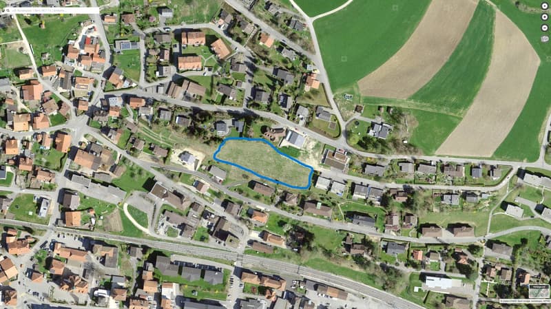 Plot of land, residential houses, roads, green field, large field