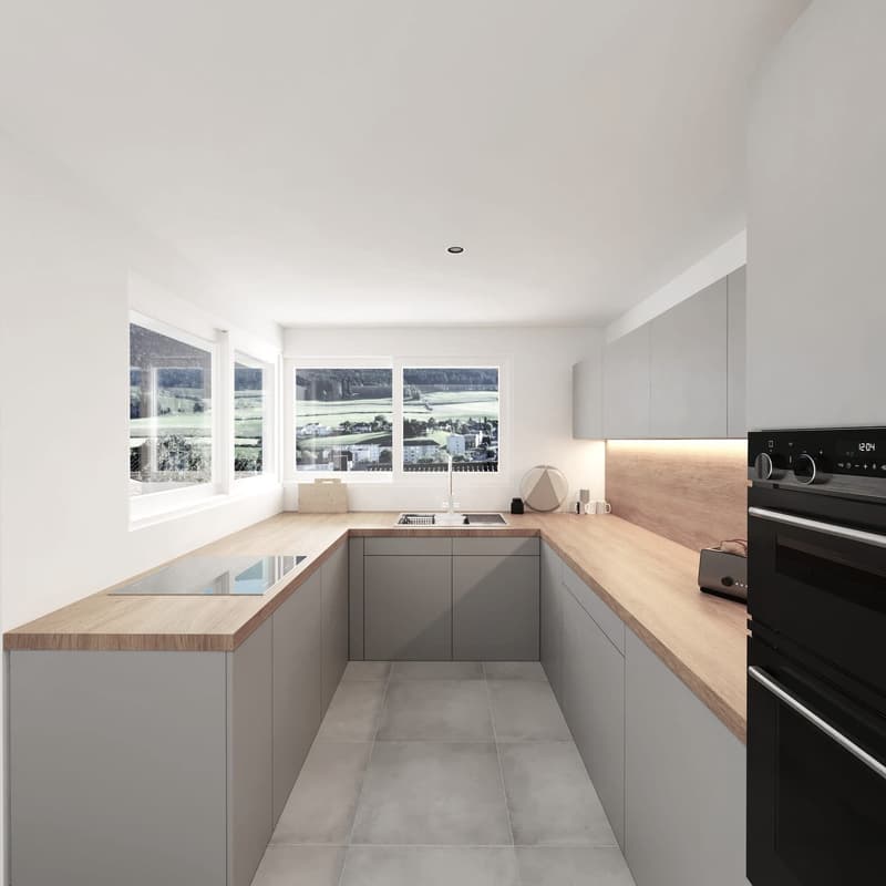 modern kitchen, large windows, wooden countertops, modern appliances, grey cabinets, large induction cooktop