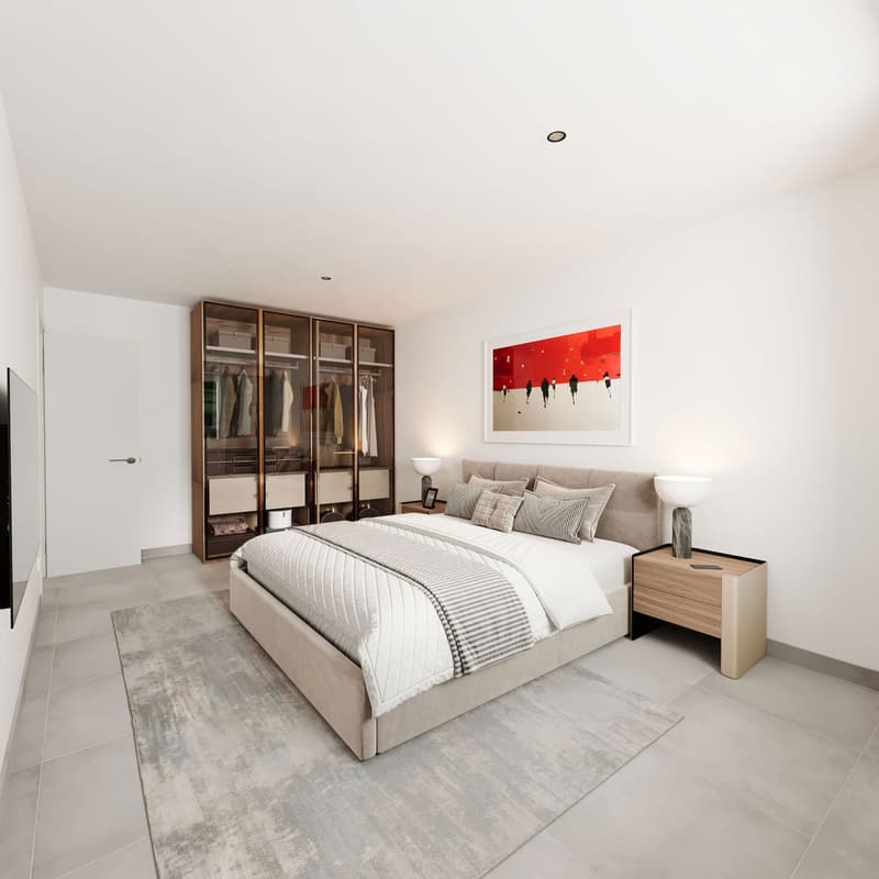 modern designed bedroom with bed, carpet, walk-in closet, bedside tables, wall lamp, picture frame