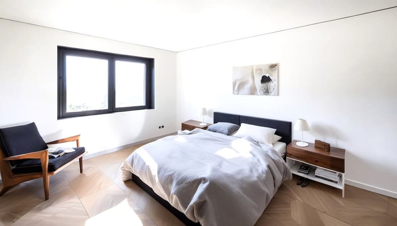 Modern designed bedroom with a large window, wooden chair, wooden floor, double bed, nightstands, and lamps