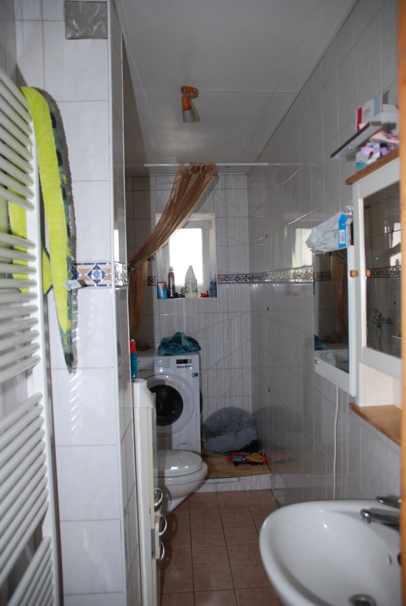 Immeuble Locatif à Peseux de 3 appartements, local commercial et garages (16)