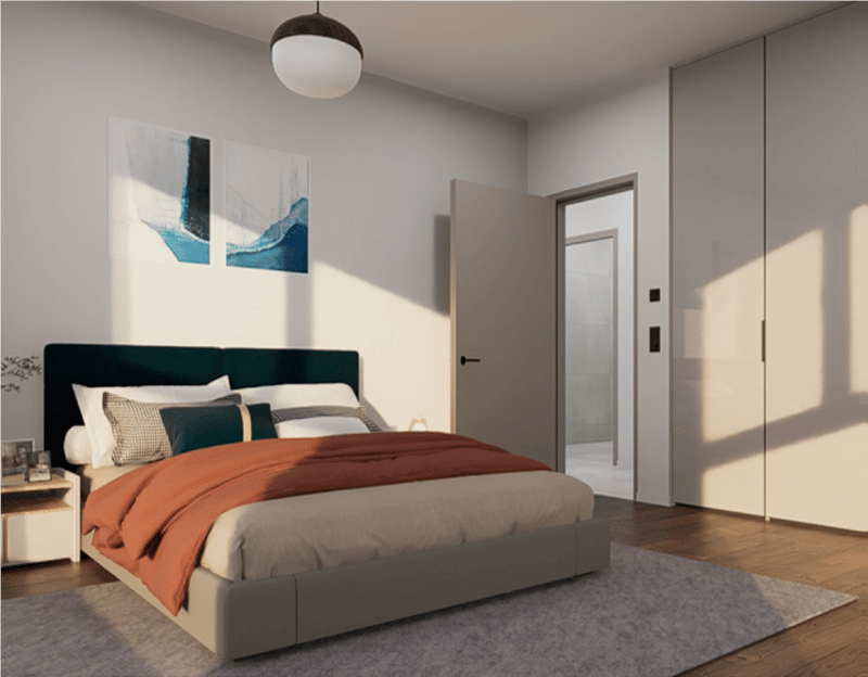 Bedroom with bed, nightstand, carpet, two paintings, sliding door, and walk-in closet