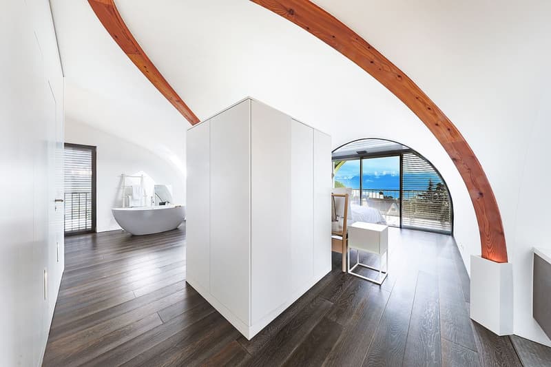 UN CHEF D'OEUVRE ARCHITECTURAL AVEC UNE SUBLIME VUE SUR LE LAC & LES ALPES
