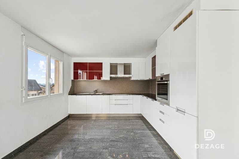 Appartement traversant aux volumes exceptionnels : 4 chambres et garage-box ! (5)