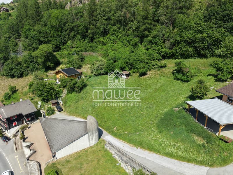 Terrain de 1682 m2 avec permis en force pour 3 chalets (5)