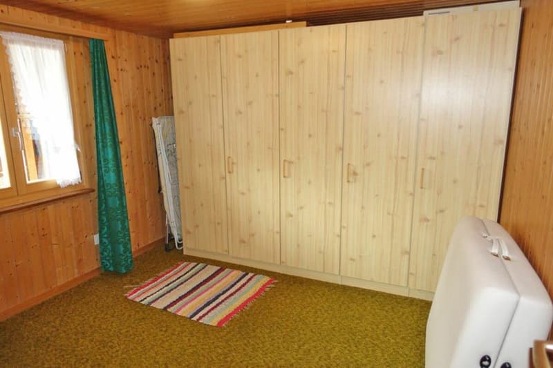 Das zweite Doppelschlafzimmer mit Blick zum Piz Mundaun.