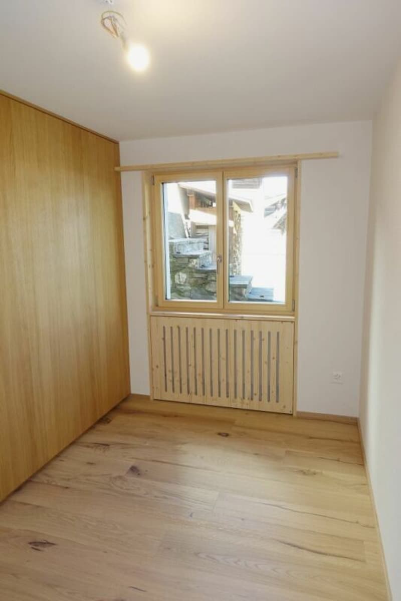 Das zweite Schlafzimmer mit Einbauschränken
