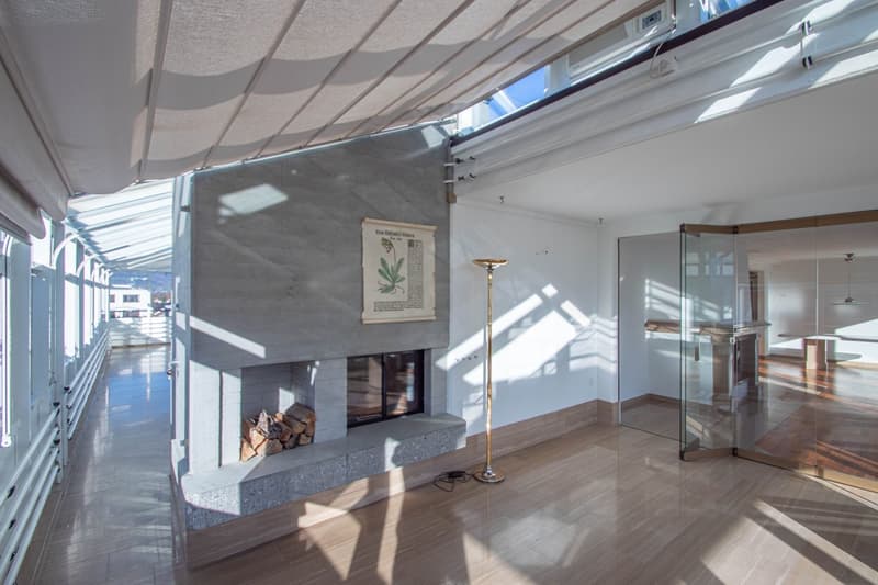 Verglaste Dachterrasse mit Cheminée