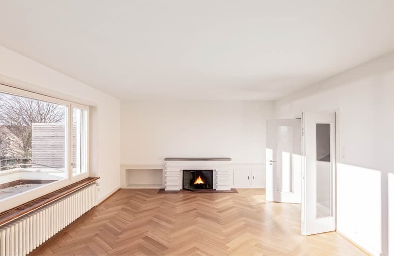 modern fireplace, parquet flooring, white walls, large windows, radiators