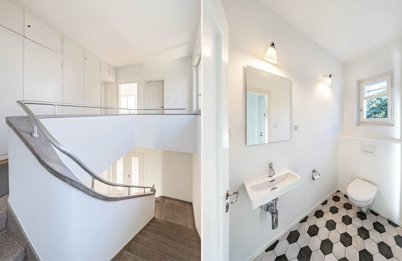 Bathroom with sink, toilet, mirror, tiled floor, wall mounted lamp.
